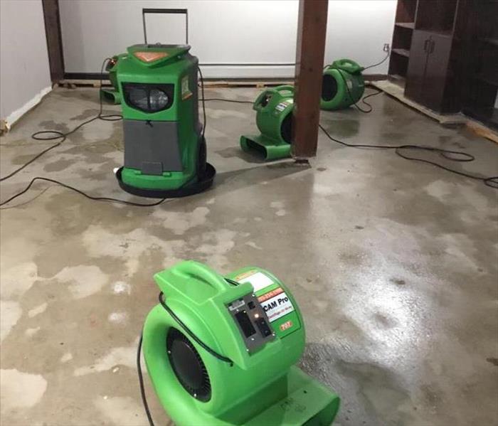 servpro drying equipment, stripped floor to concrete