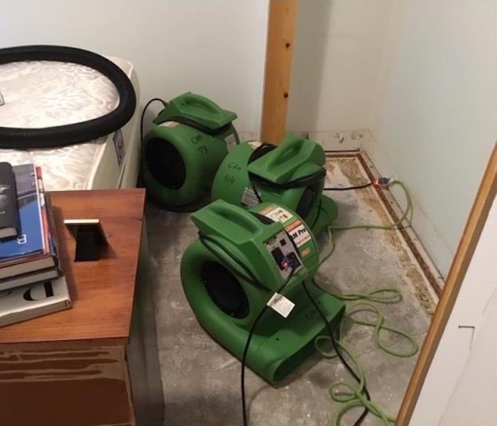 Air movers in bedroom drying it out.