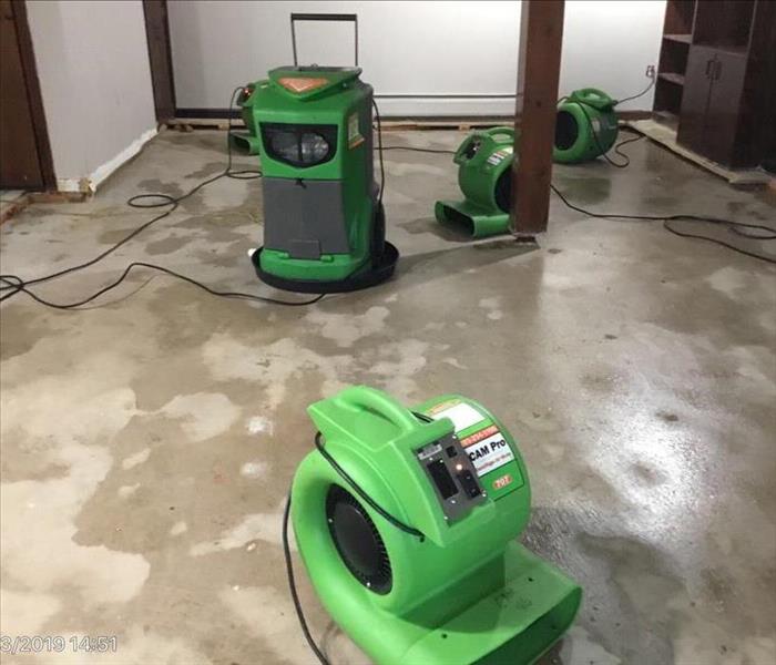 dehus and air movers drying flooded room