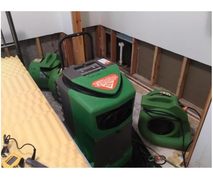 servpro equipment in a water damaged house