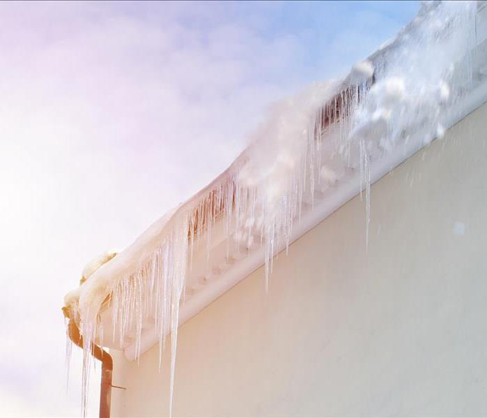Ice dam on a the roof of a home.